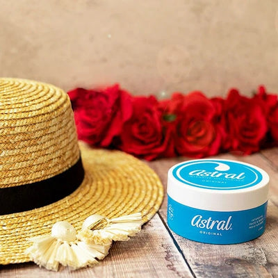 Astral Intensive Moisturiser 500ml: Astral cream tub with a straw hat and red roses.