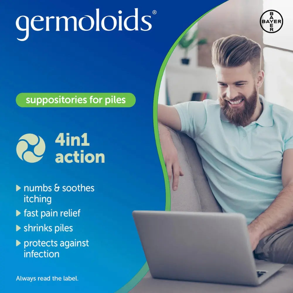 Advertisement for germoloids suppositories for piles with a man using a laptop.