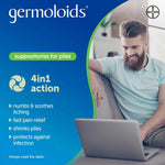 Advertisement for germoloids suppositories for piles with a man using a laptop.