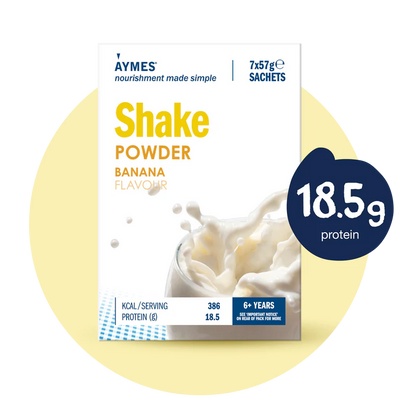 Aymes banana-flavored shake powder package with protein content information.
