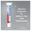 Canesten tube for athlete's foot on a gray background with text about its effectiveness.