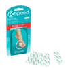 Compeed blister plaster packaging with individual plasters on a white background