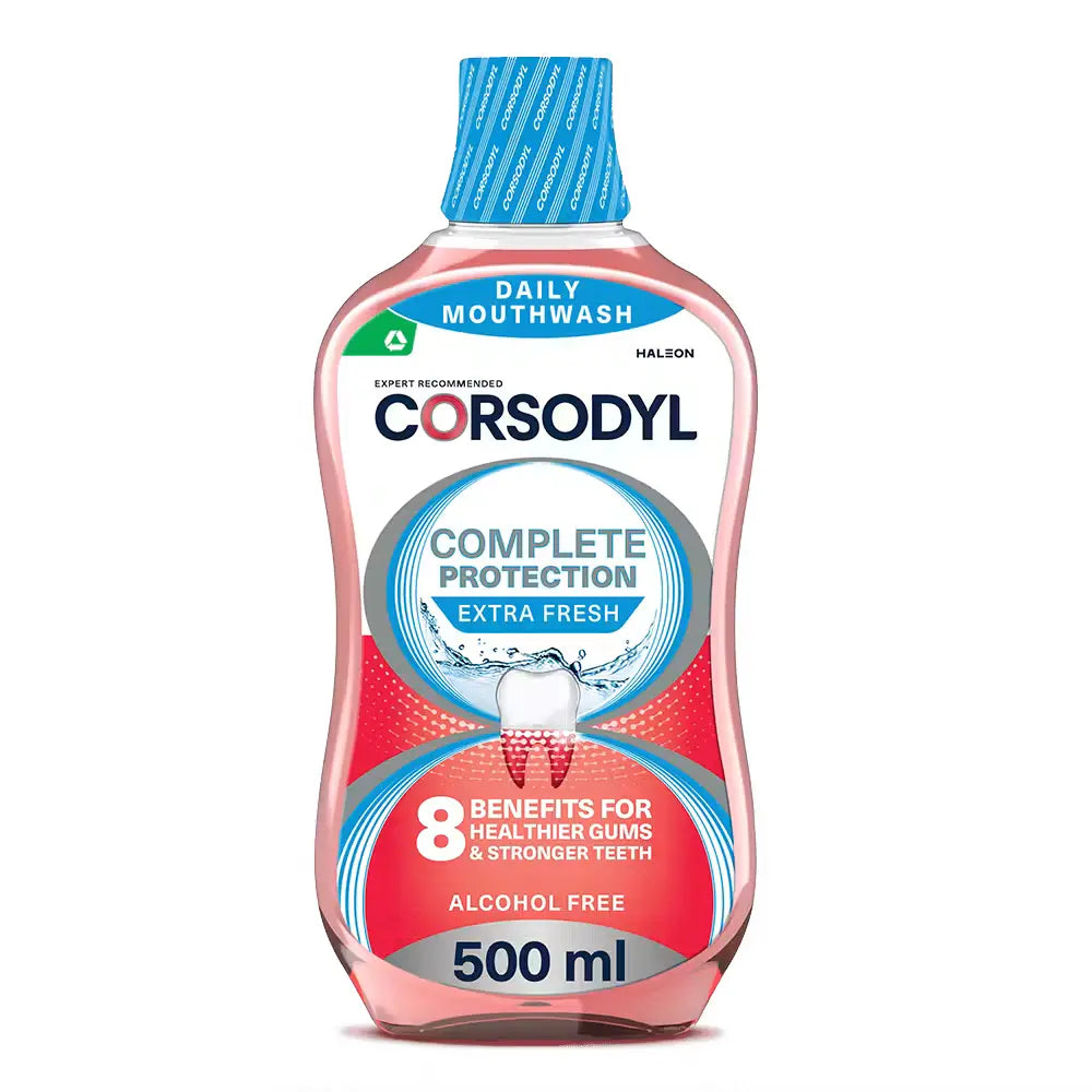 A 500 ml bottle of Corsodyl Daily Mouthwash Extra Fresh 500ml, featuring a pink liquid inside a clear bottle with a blue cap and a red, white, and blue label.