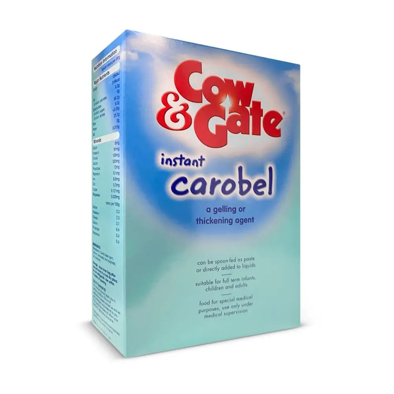 A box of Cow & Gate Instant Carabel thickening agent, featuring a blue sky graphic background with red and blue branding text.