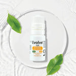 A bottle of Evolve HA Intensive Eye Drops centered on a white water-textured background with a circular clear ring and green leaves around it.