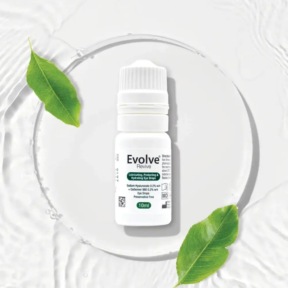 A 10ml bottle of Evolve Passive cooling essential oil on a white circular plate with water ripples, accented by two green leaves.