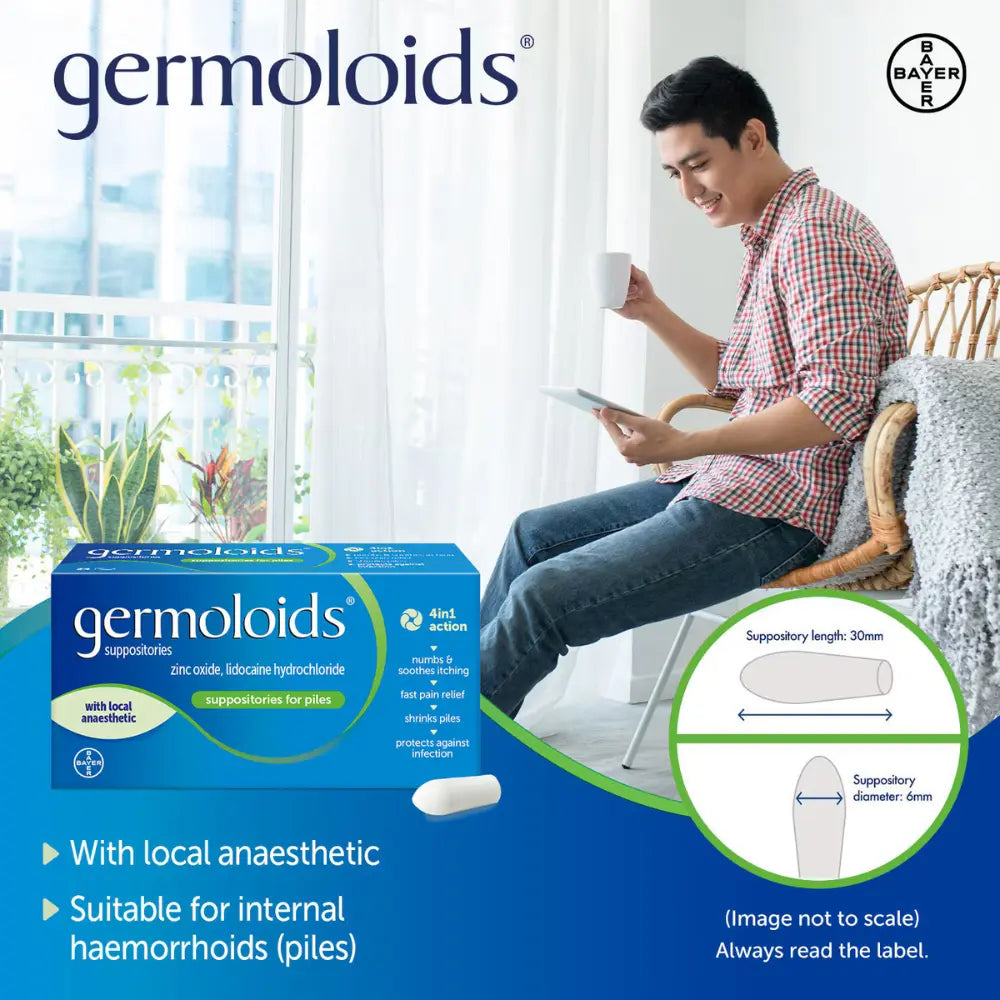 Germoloids suppositories packaging with a man sitting on a couch holding a cup.