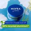 Nivea cream tins with recycled aluminum label against a blue sky background