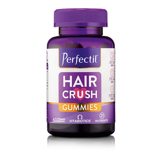 Delicious Perfectil Hair Crush Gummies, a tasty way to support your hair health.