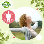 Senokot Max Strength Tablets product information graphic featuring a smiling woman with curly hair in an outdoor setting, framed in a circular cutout. The graphic includes the Senokot brand logo, a red circular icon with a human silhouette and text about helping restore normal bowel movement, decorative green leaves, and product details at the bottom.