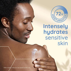 Person applying Aveeno lotion: intensely hydrates sensitive skin for 72 hours.