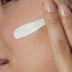 cerave spf 50 moisturizer applying on face skin