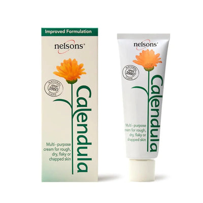 Nelsons Calendula Cream multi-purpose cream shown as a white squeeze tube next to its matching cream box, featuring an orange calendula flower and green text on a white background.